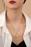 Brass diamond dust cut out initial necklace